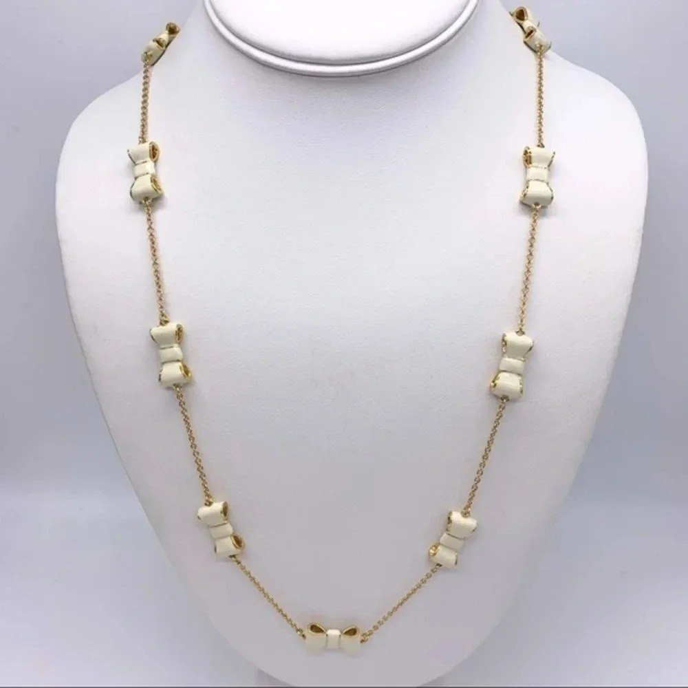 Kate Spade Take a Bow Cream Scatter Necklace